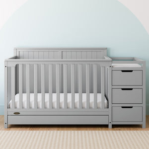 Pebble gray crib and changer with drawer in nursery