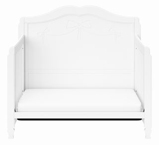 White crib in toddler bed conversion 