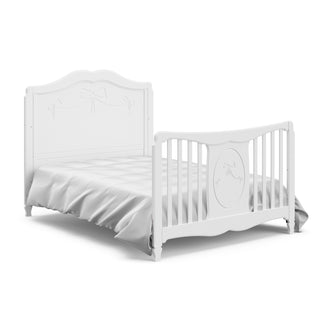 White crib in full-size bed with headboard and footboard conversion 