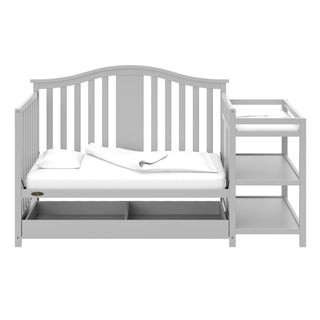 Pebble gray crib and changer with drawer in daybed conversion with open drawer 