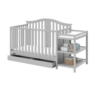 Pebble gray crib and changer angled with open drawer