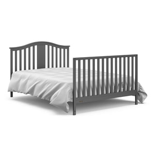 gray crib in fullsize bed with headboard adn footboard conversion