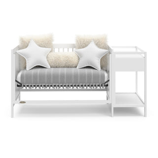 White crib and changer in daybed conversion
