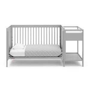 Pebble gray crib and changer in toddler bed conversion