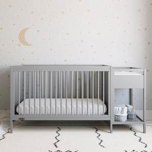 Pebble gray crib and changer in nursery