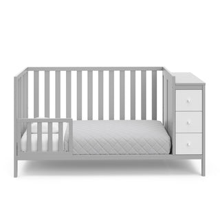 pebble crib and white with storage in toddler bed conversion with one safety guardrail