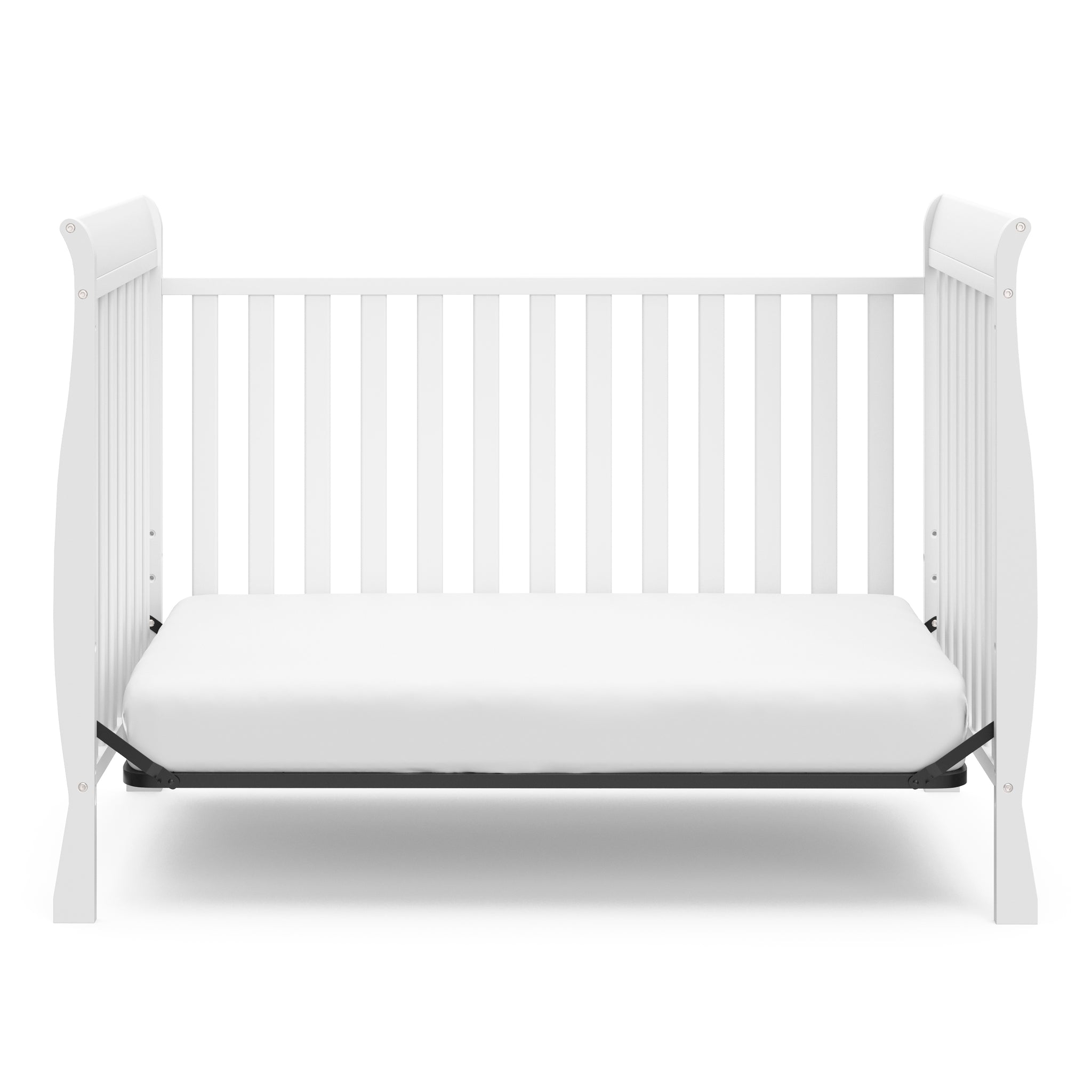 White crib in toddler bed conversion