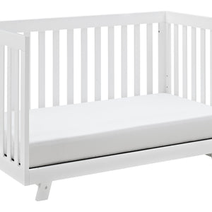 White crib in toddler bed conversion