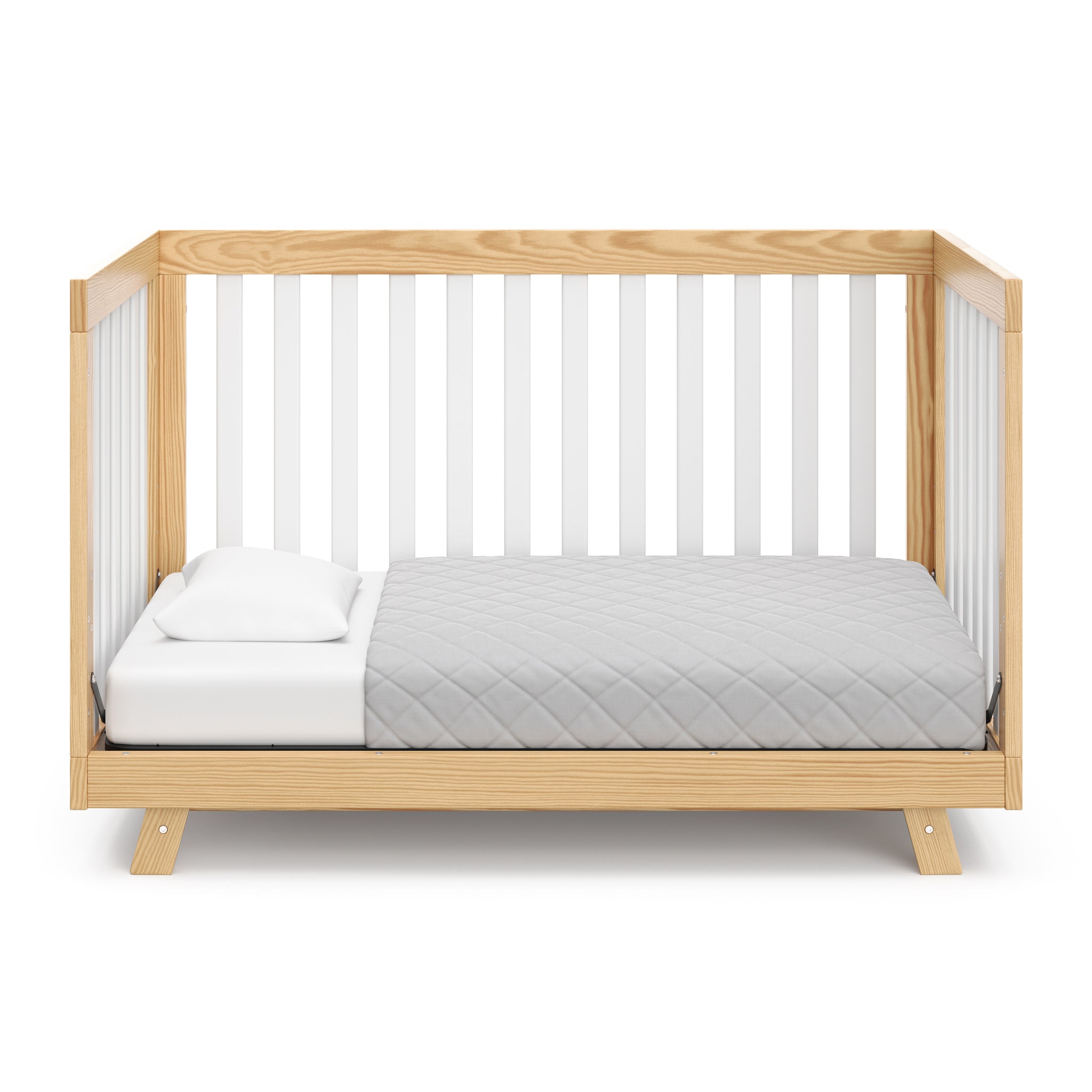 Natural with white crib in toddler bed conversion
