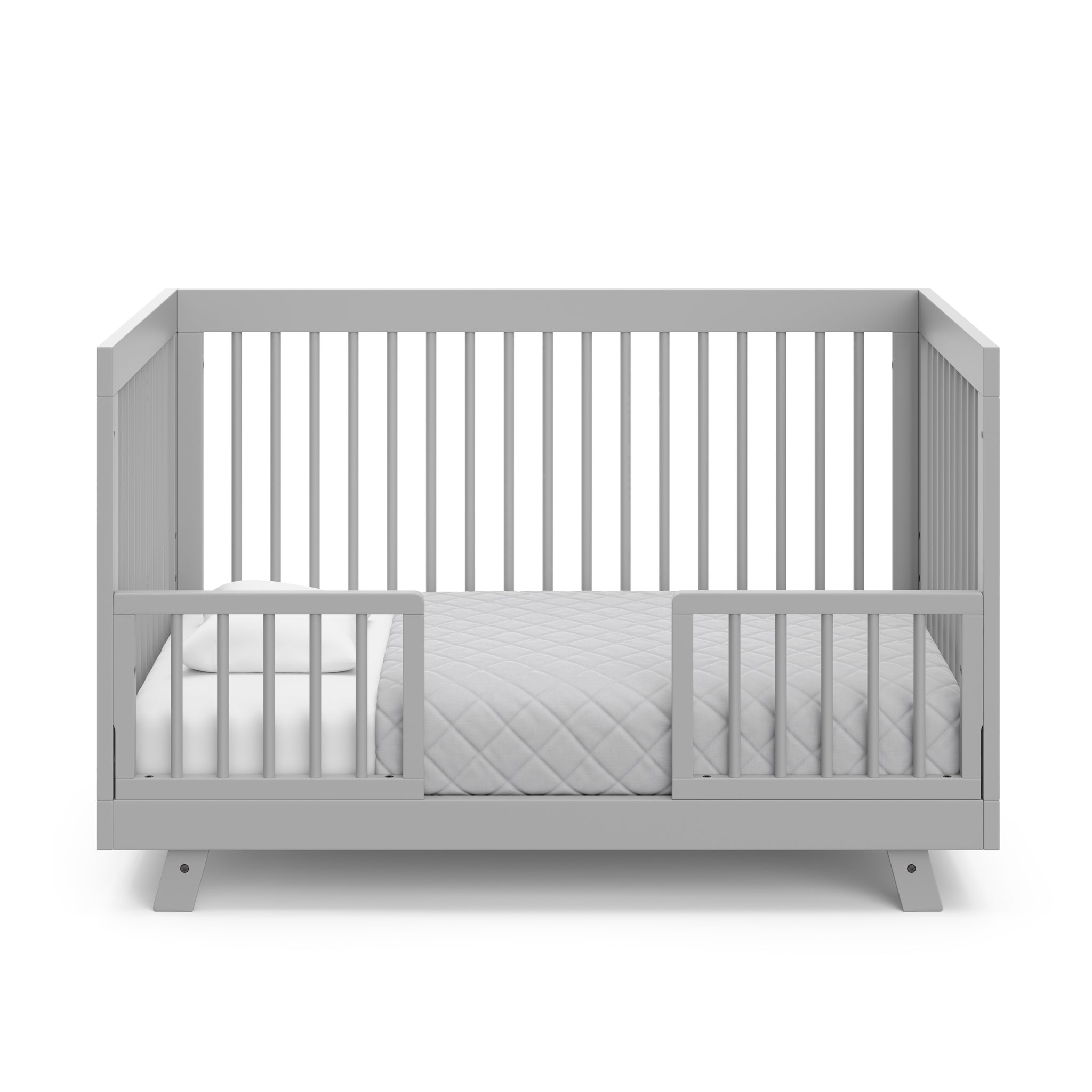 pebble gray in toddler bed conversion with two safety guardrails