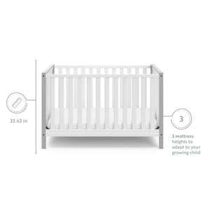 White crib with pebble gray with features graphic