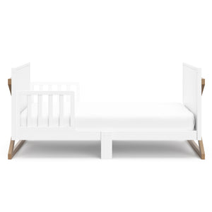 Front view of white adn vintage driftwood toddler bed with guardrails