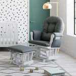 white glider and ottoman with gray cushions in nursery
