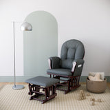 espresso glider and ottoman with gray cushions in nursery