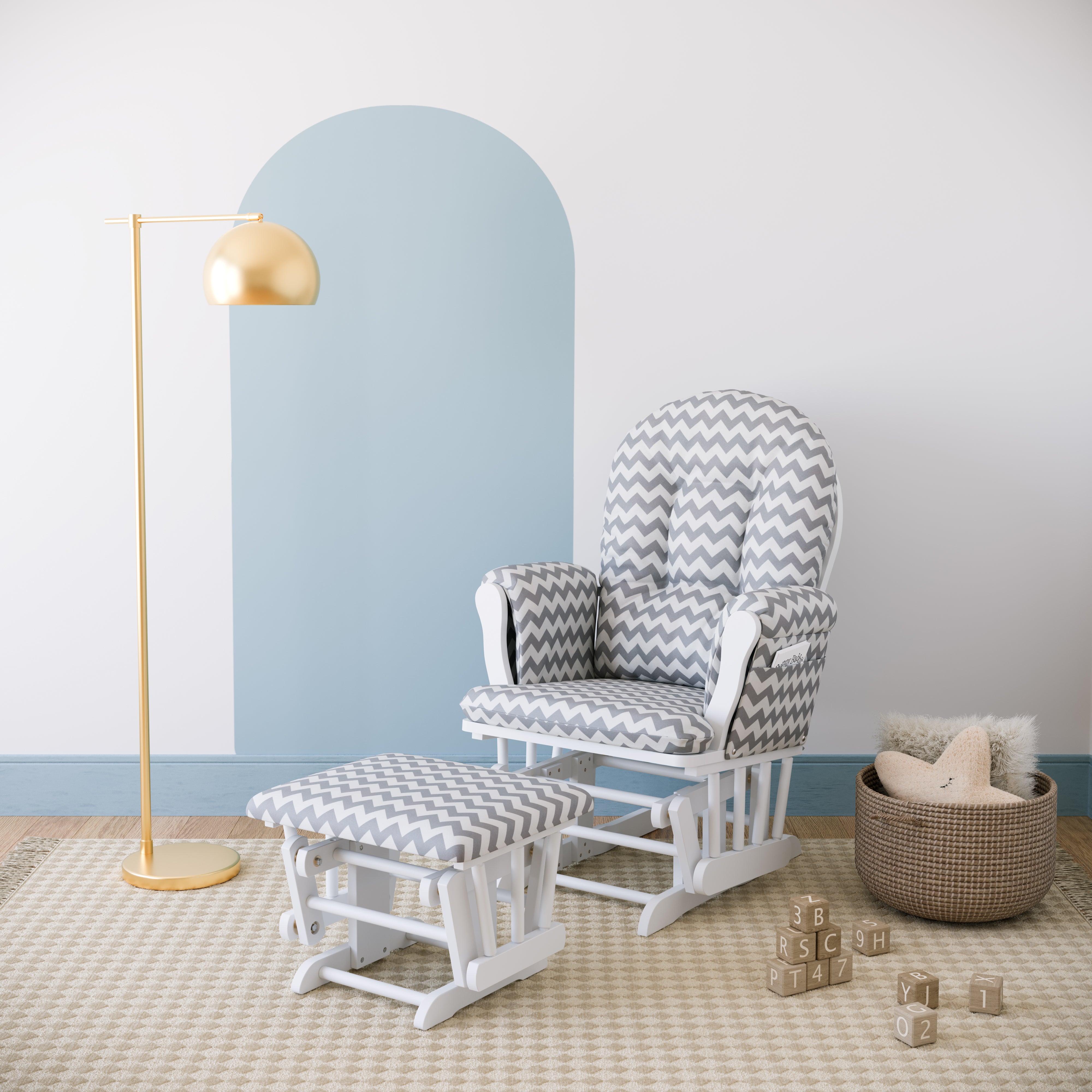 white glider and ottoman with gray chevron cushions in nursery