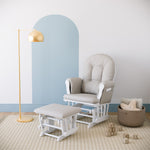 white glider with taupe swirl cushions in nursery