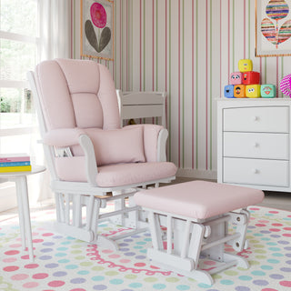 white glider and ottoman with pink swirl cushions in nursery 