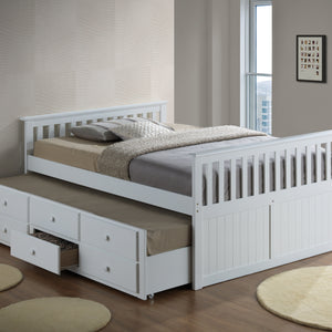 White full size captains bed with open twin trundle and open drawer in nursery