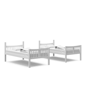 white bunk bed configured as two separate twin beds in nursery