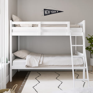 white bunk bed with fixed ladder angled in nursery side view