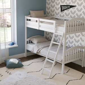 white bunk bed with fixed ladder angled in nursery