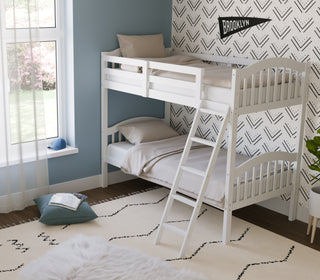 white bunk bed with fixed ladder angled in nursery