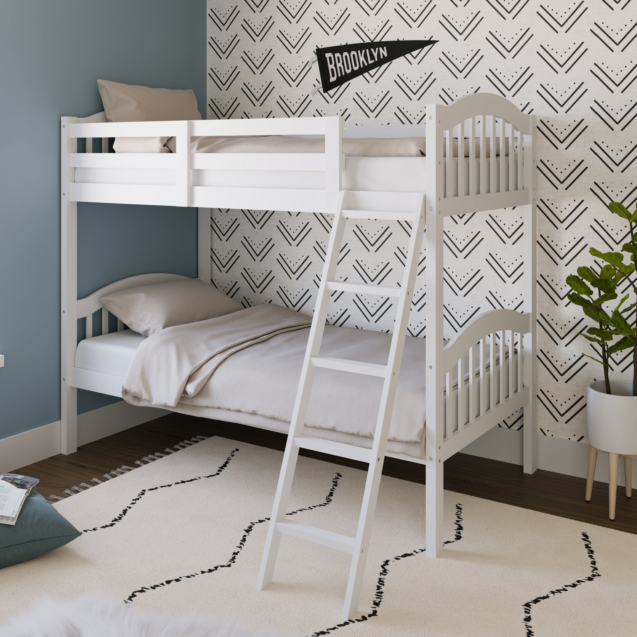 white bunk bed with fixed ladder angled in nursery
