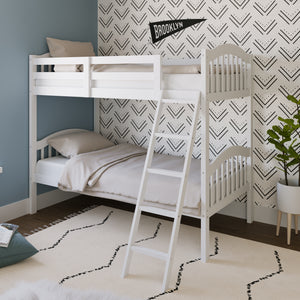 white bunk bed with fixed ladder angled in nursery