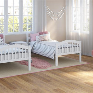 white bunk bed configured as two separate twin beds in nursery