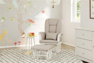 white glider and ottoman with taupe swirl cushions in nursery with 6 drawer dresser 