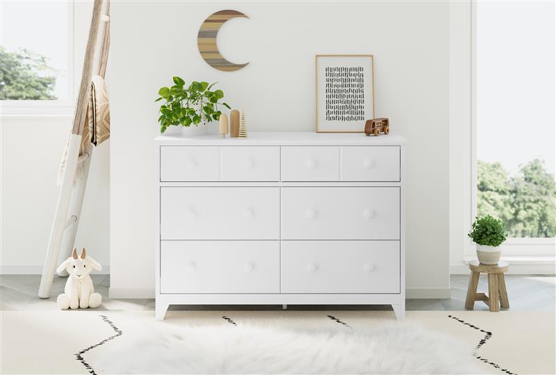 Front view of white 6 drawer dresser in nursery