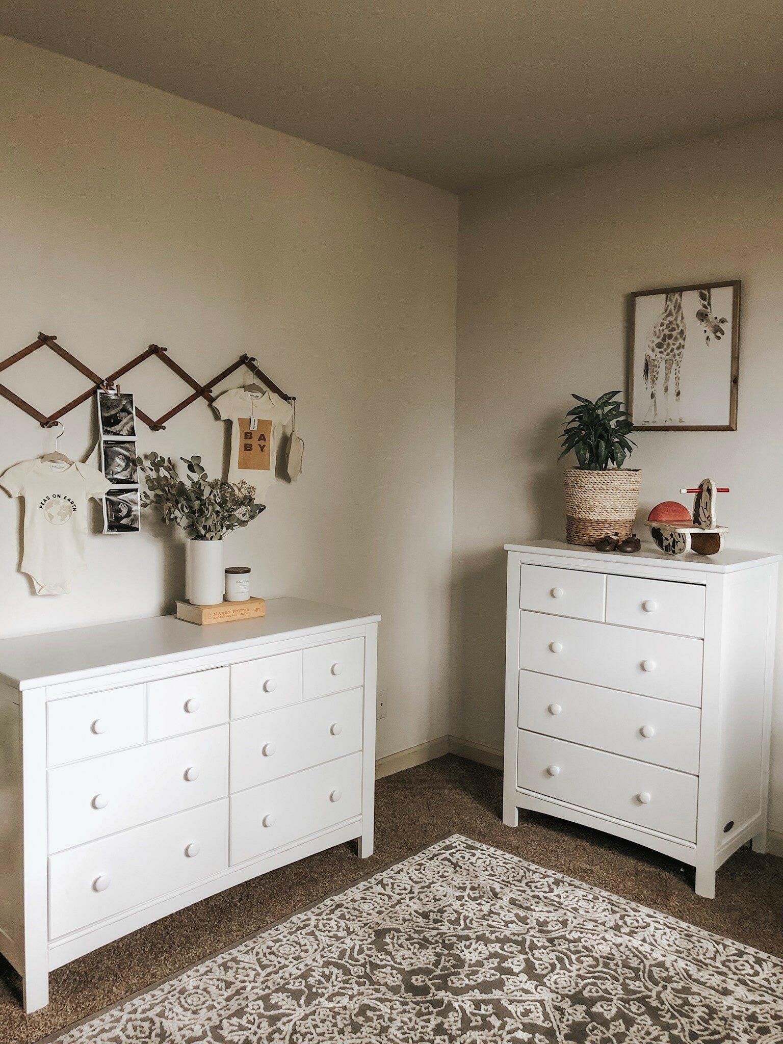 White 6 drawer dresser and white 4 drawer chest in nursery