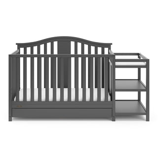 Front view of gray crib and changer