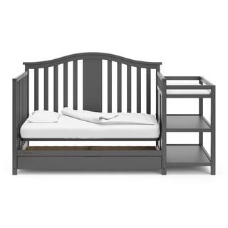 gray crib and changer in daybed conversion