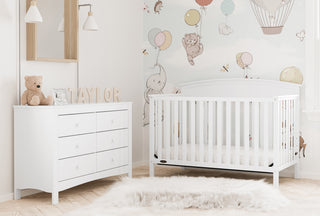 White 6 drawer dresser in nursery