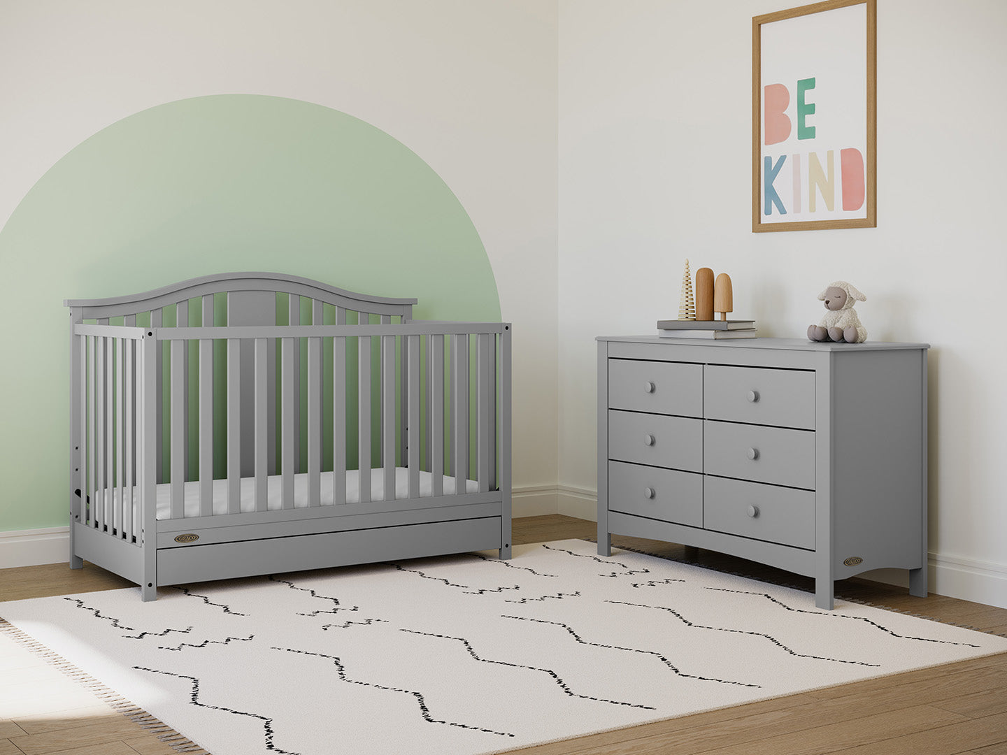 Pebble gray crib with drawer in nursery