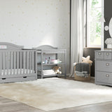 Graco® Story Customizable 5-in-1 Convertible Crib with Drawer.