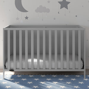 Pebble gray crib in nursery