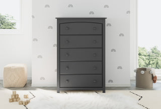 gray 5 drawer dresser in nursery