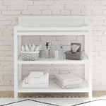 Storkcraft® Alpine Changing Table with Bonus Water-Resistant Changing Pad.