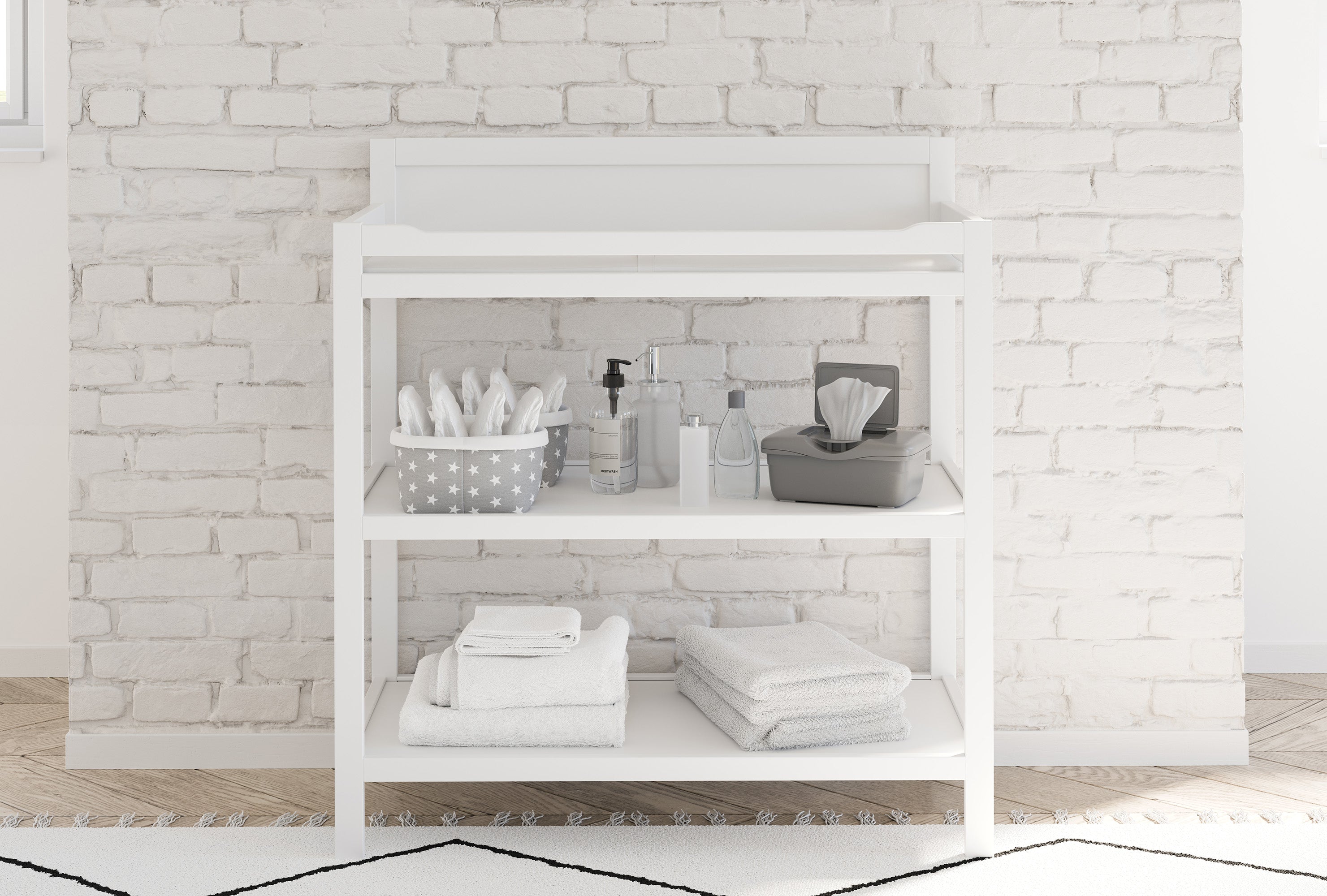 Storkcraft® Alpine Changing Table with Bonus Water-Resistant Changing Pad.