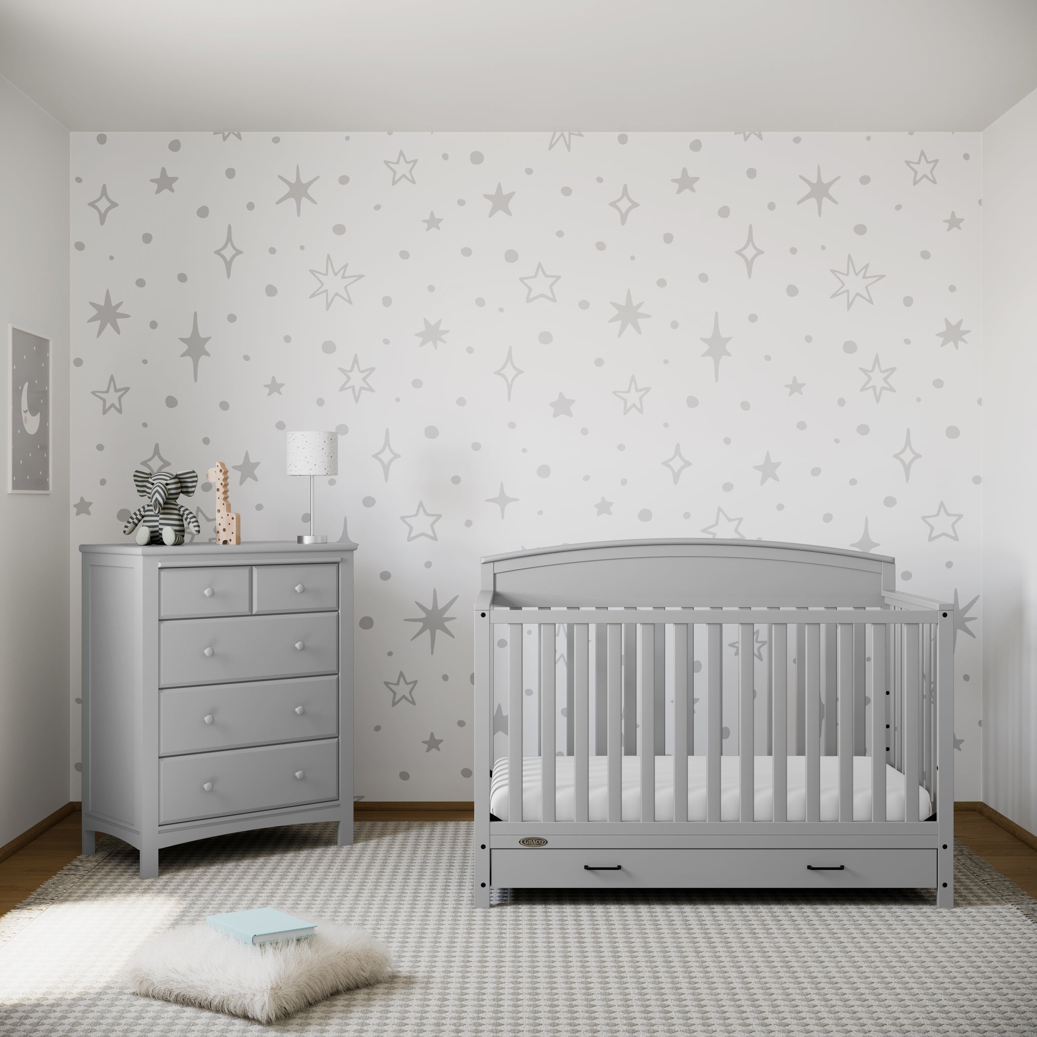 pebble gray crib with drawer in nursery