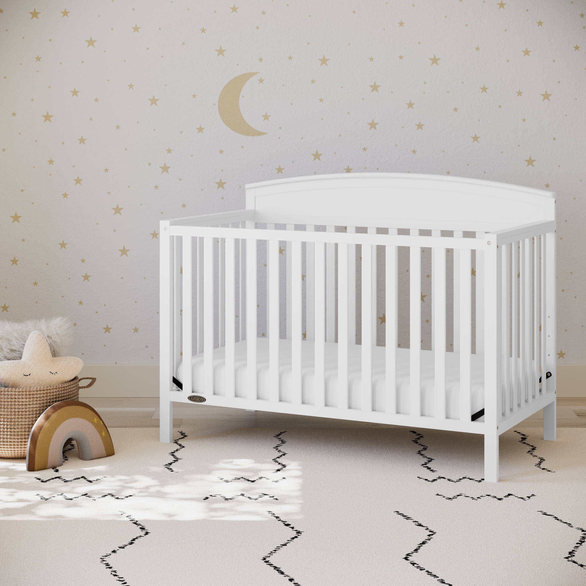 white crib in nursery