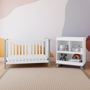 white with pebble gray changing table with crib in nursery