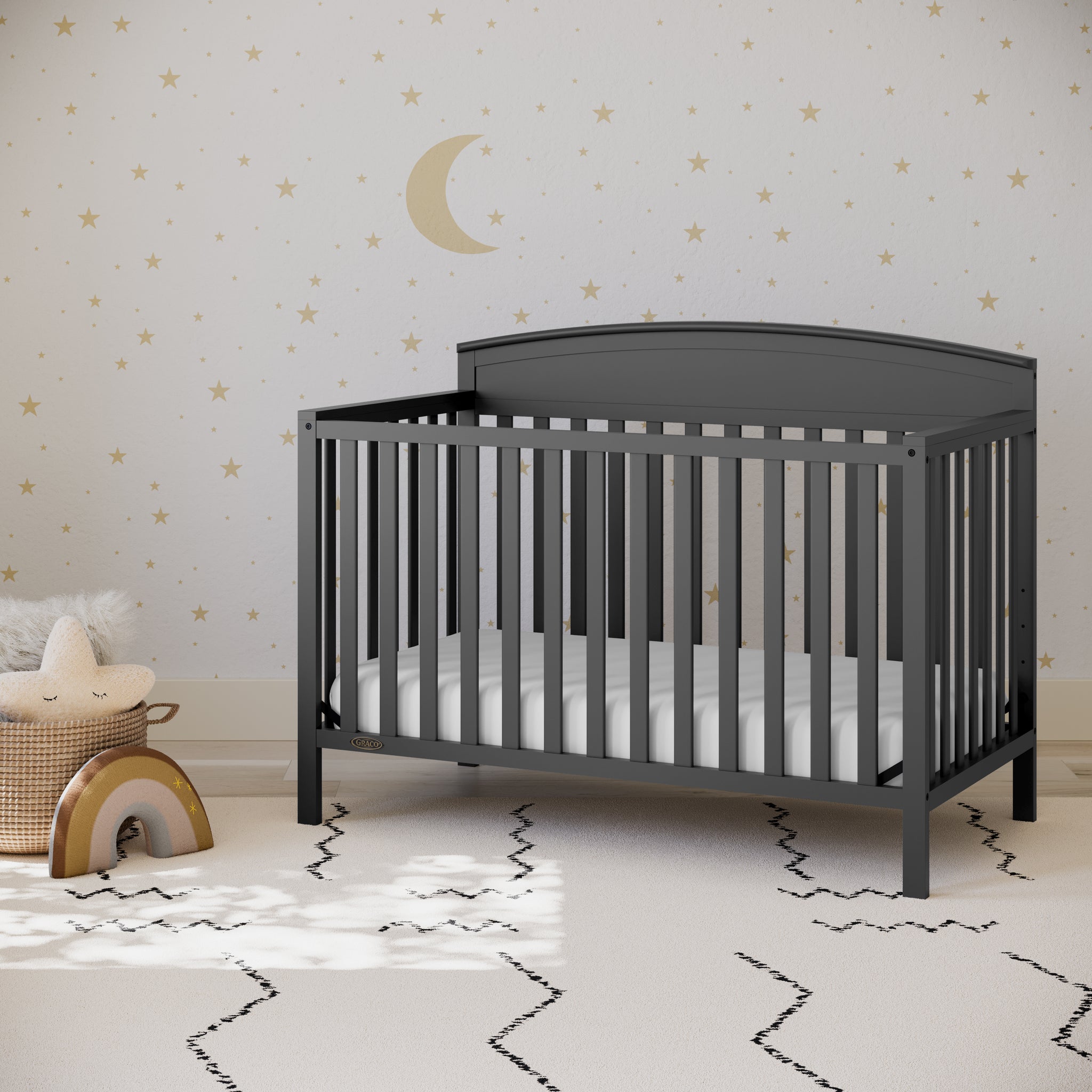 gray crib in nursery