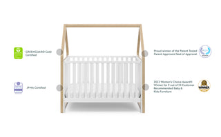 White crib with driftwood with features graphic 