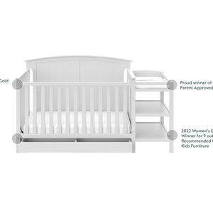 White crib and changer features graphic 
