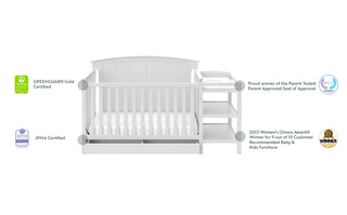 White crib and changer features graphic 