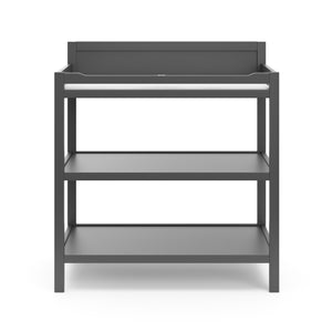 Front view of gray changing table with two open shelves