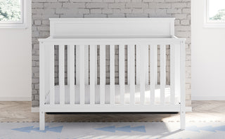 white crib in nursery